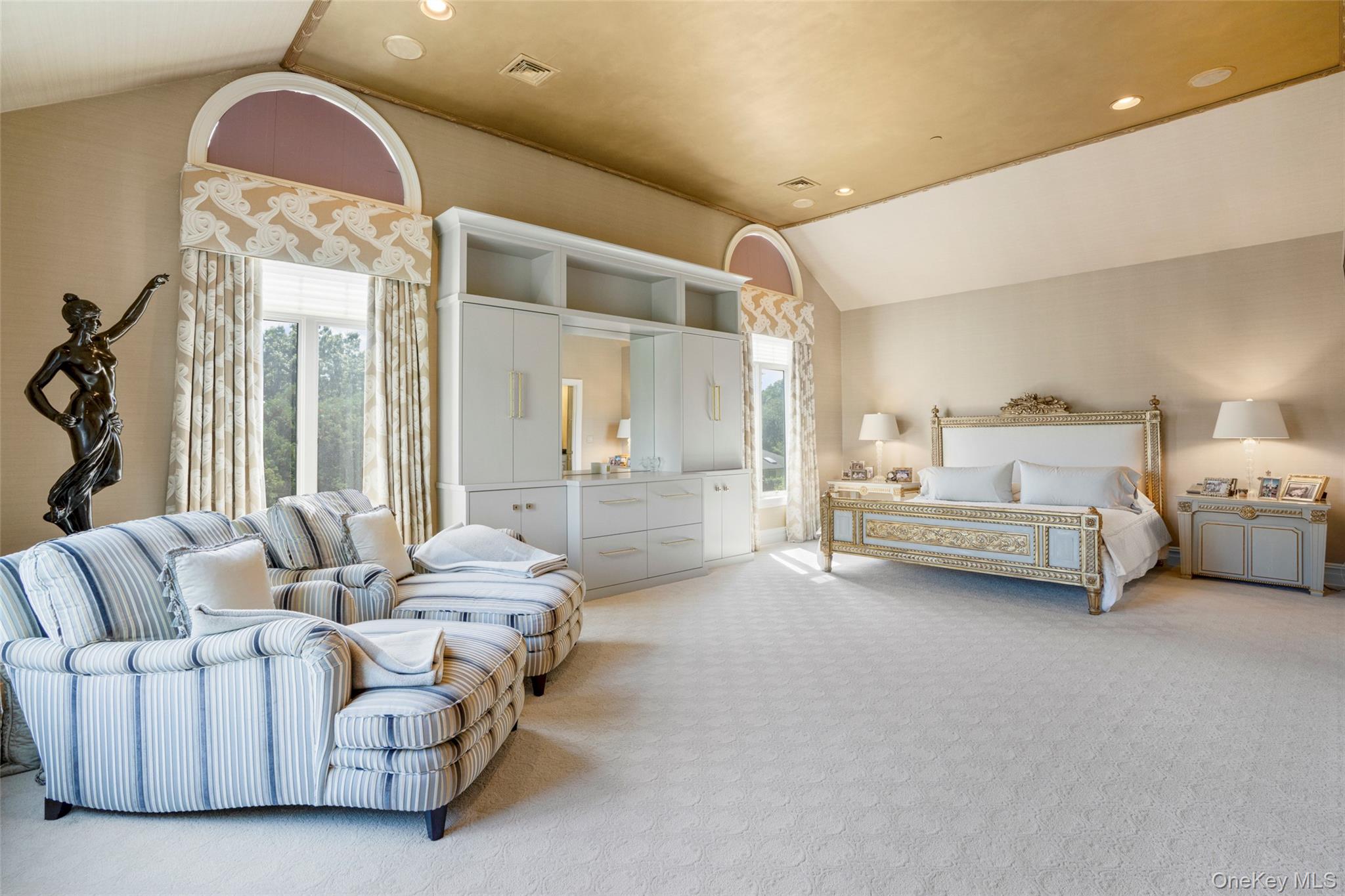 23 Pheasant Drive Rye, NY 10580 - Photo 17 of 35 Vaulted ceilings and double exposure create a luxury primary suite with a spa bathroom and generous closet space