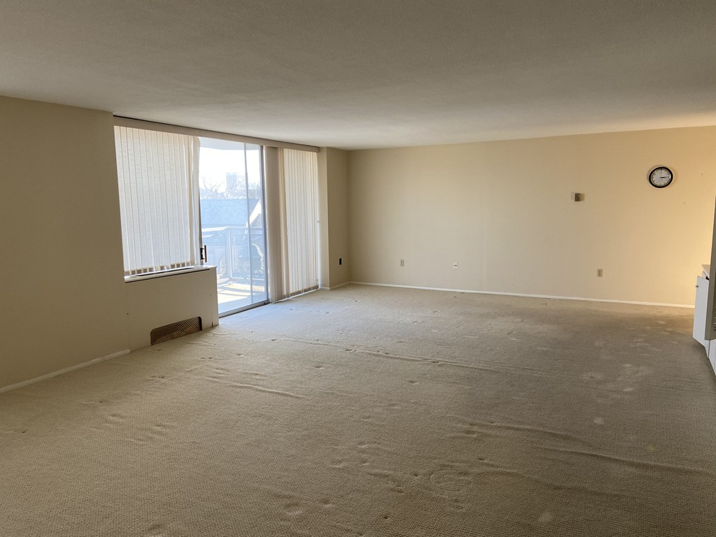 80 Salisbury Street, Unit 603 Worcester, MA 01609 - Photo 2 of 18 an empty room with windows