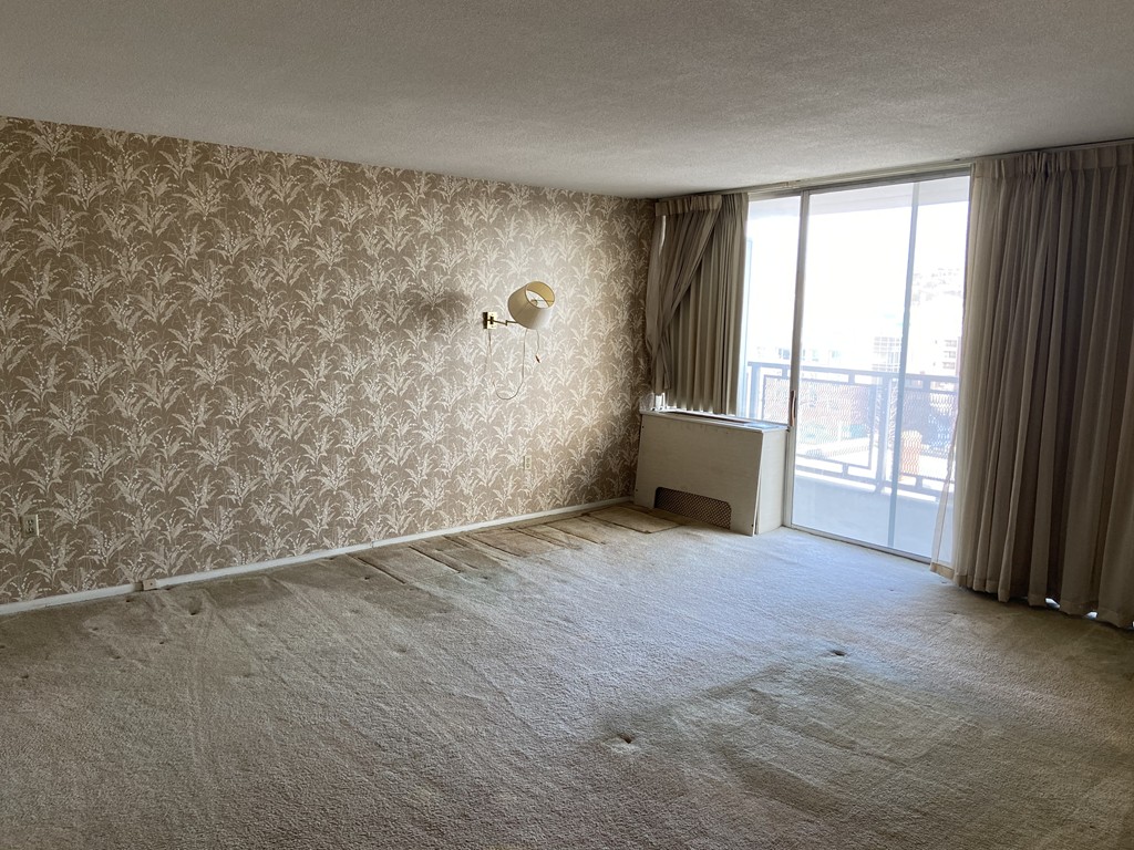 80 Salisbury Street, Unit 603 Worcester, MA 01609 - Photo 4 of 18 an empty room with windows