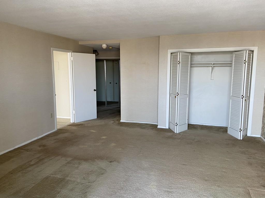 80 Salisbury Street, Unit 603 Worcester, MA 01609 - Photo 5 of 18 a view of an empty room and closet area