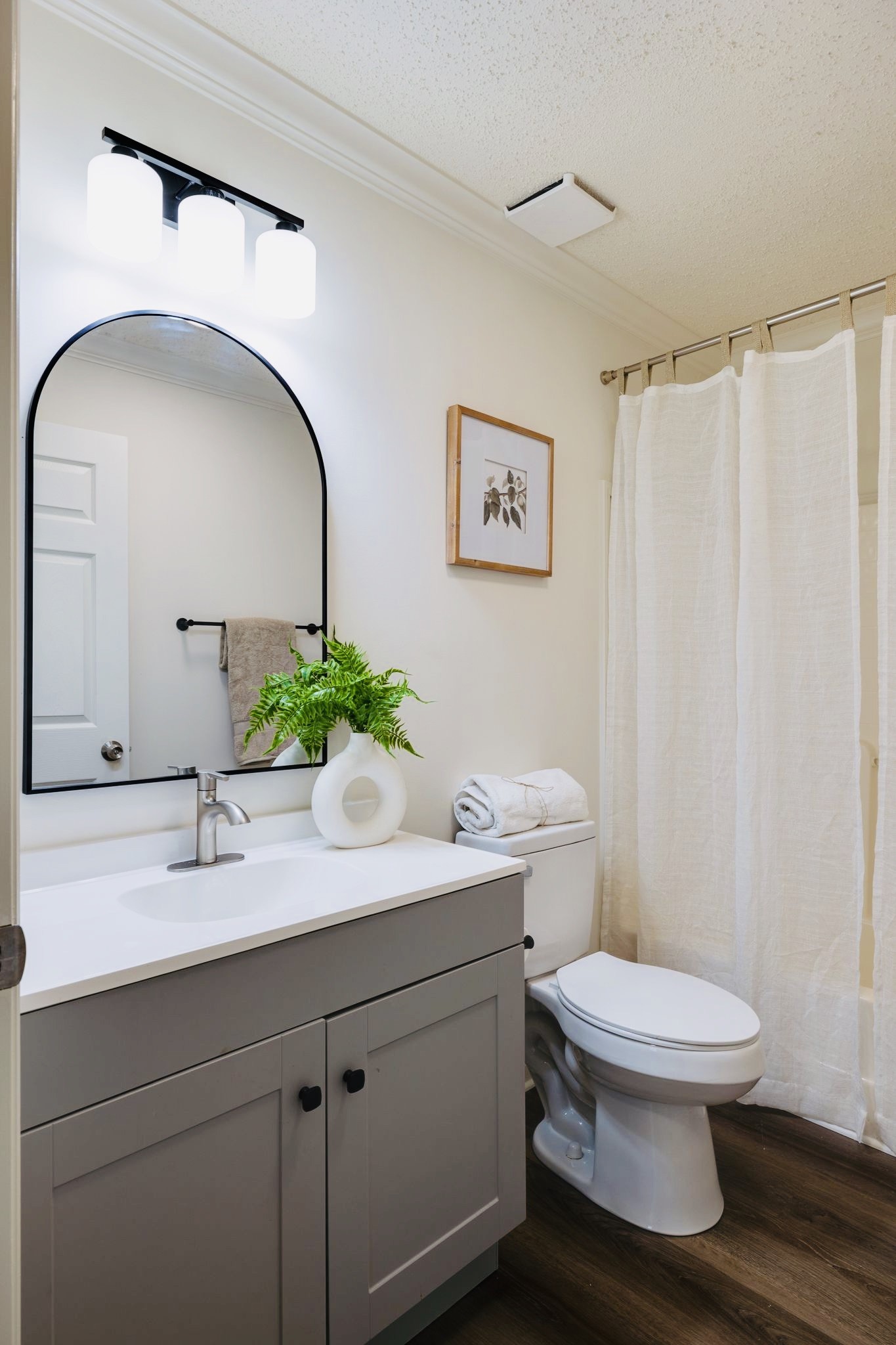 3921 Johnson Hollow Road Thompson's Station, TN 37179 - Photo 17 of 38 a bathroom with a toilet sink and mirror