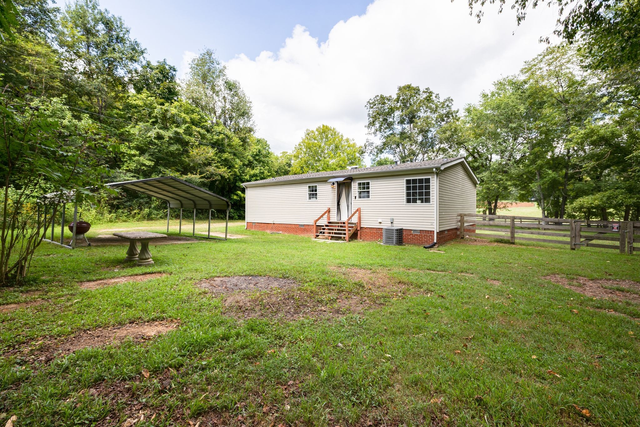 3921 Johnson Hollow Road Thompson's Station, TN 37179 - Photo 20 of 38 a front view of house with yard and green space