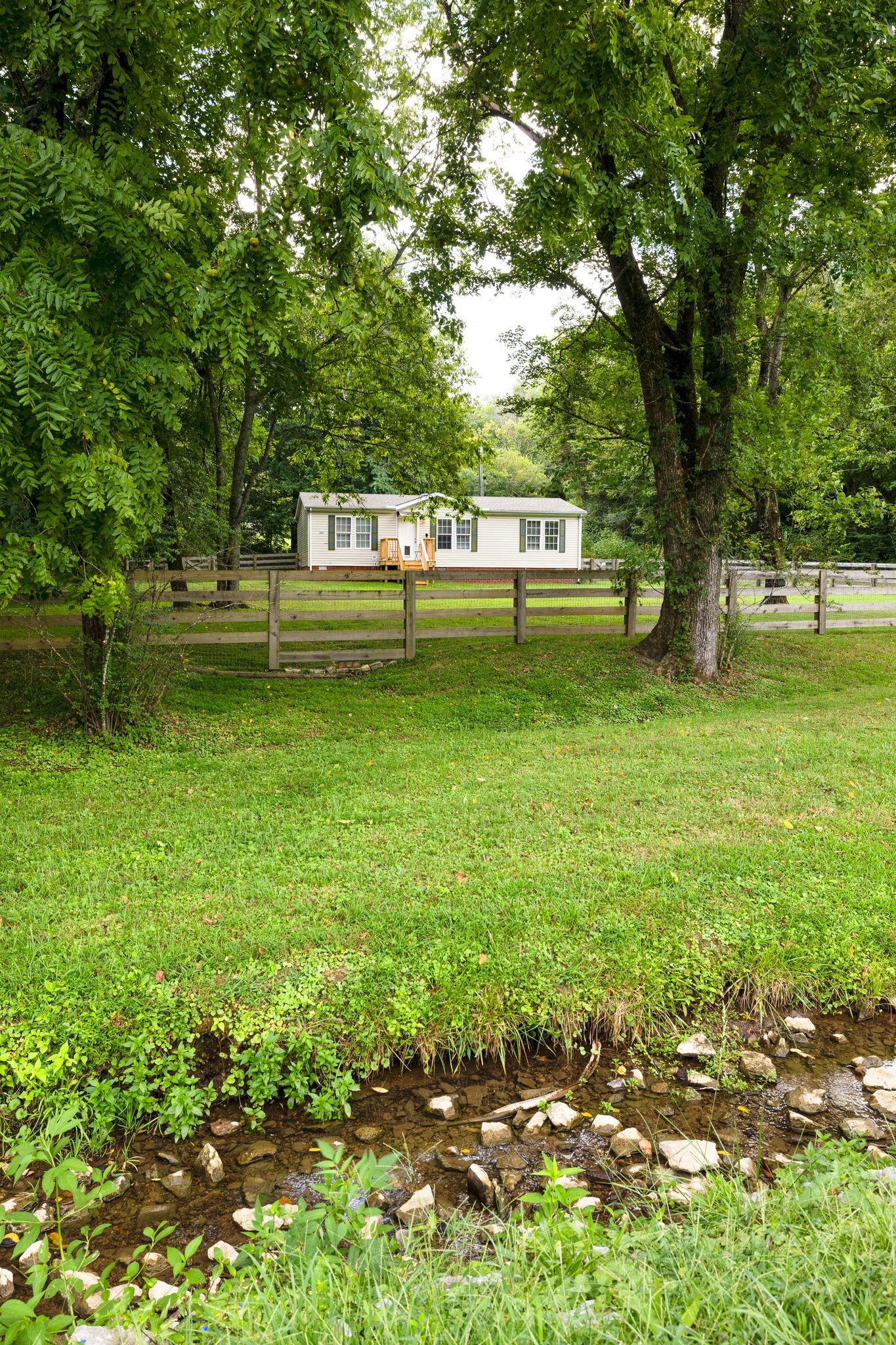 3921 Johnson Hollow Road Thompson's Station, TN 37179 - Photo 22 of 38 a view of a garden with trees