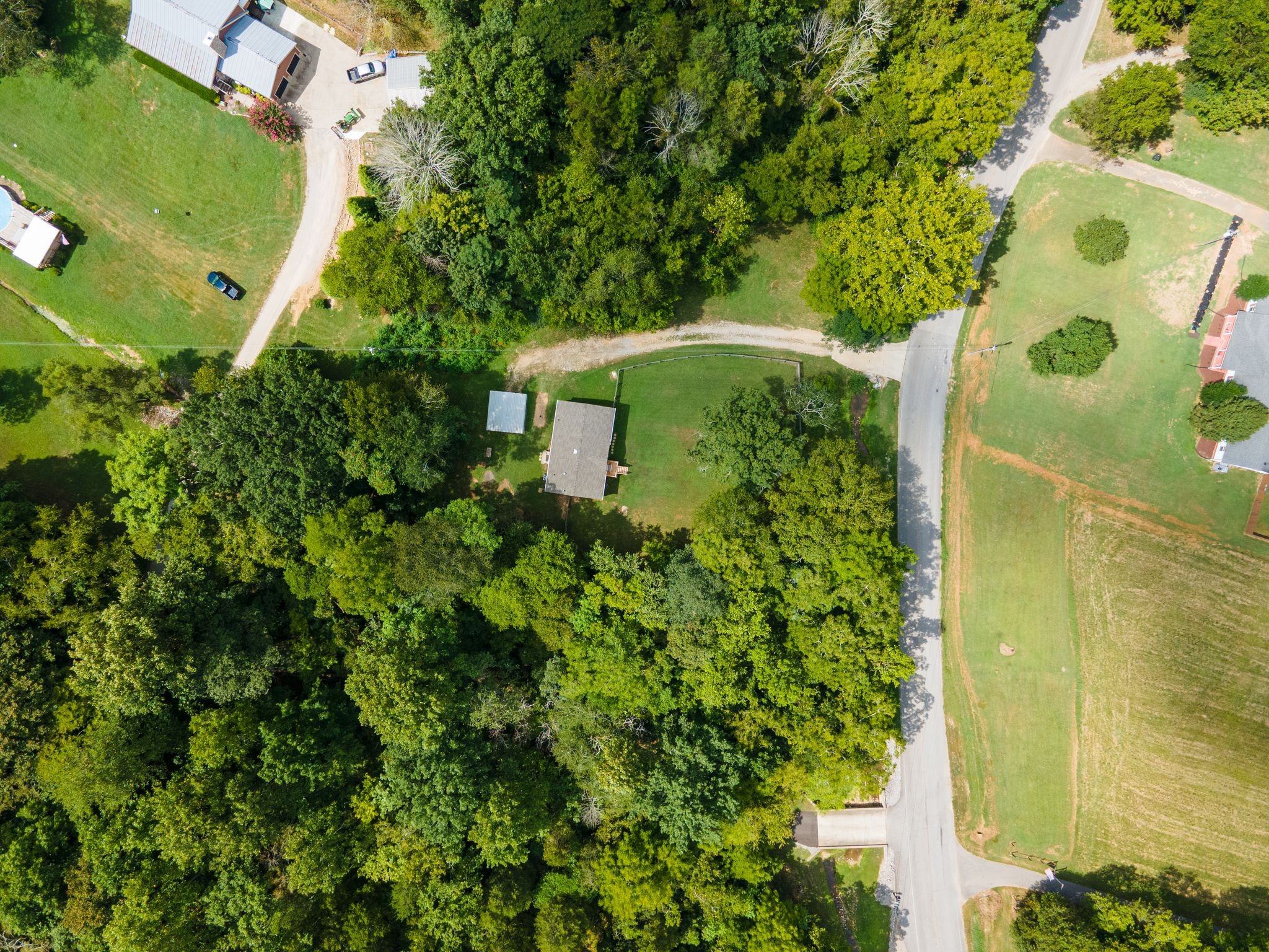 3921 Johnson Hollow Road Thompson's Station, TN 37179 - Photo 23 of 38 an aerial view of a house with a yard