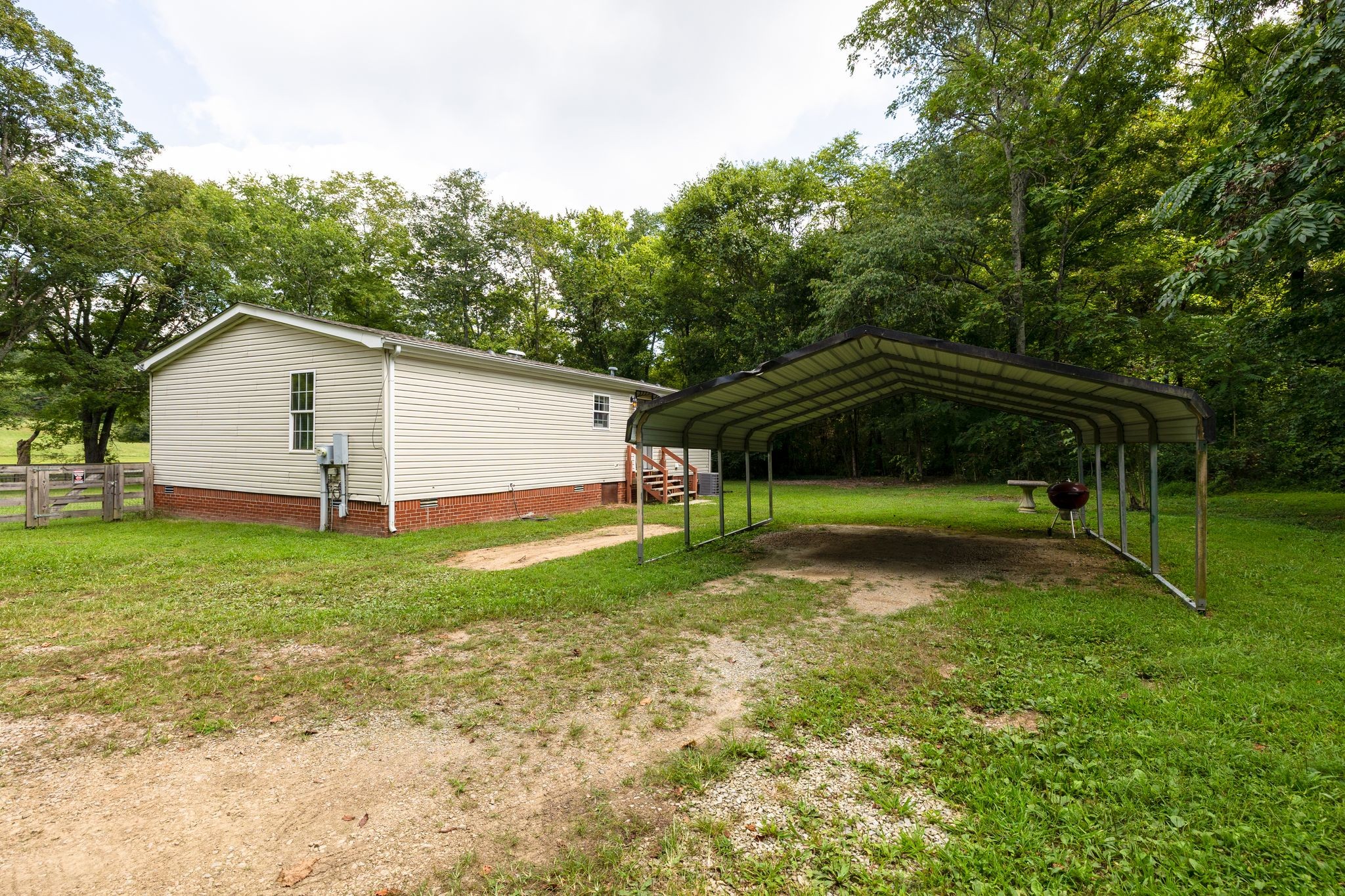 3921 Johnson Hollow Road Thompson's Station, TN 37179 - Photo 25 of 38 a view of backyard with a garden and entertaining space