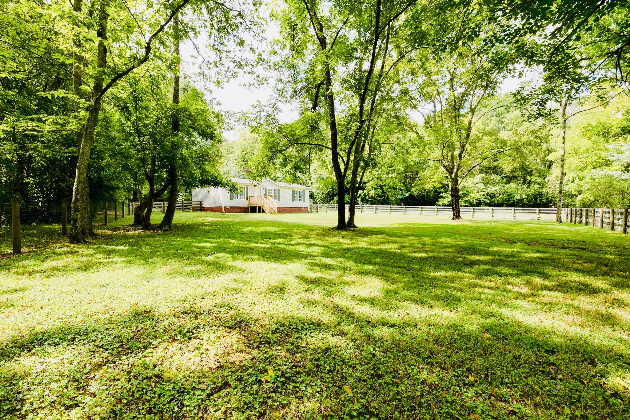 3921 Johnson Hollow Road Thompson's Station, TN 37179 - Photo 28 of 38 a view of field with trees in the background