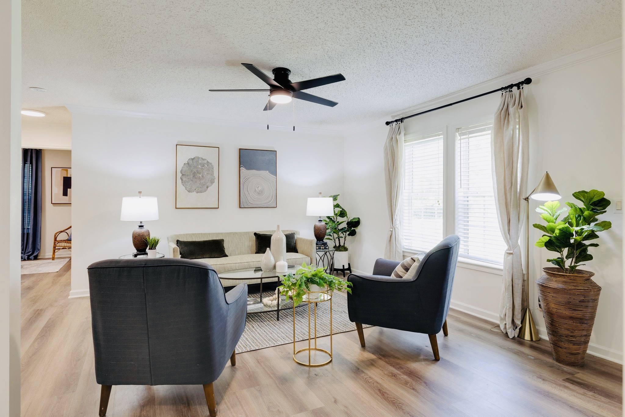 3921 Johnson Hollow Road Thompson's Station, TN 37179 - Photo 4 of 38 a living room with furniture potted plant and a window