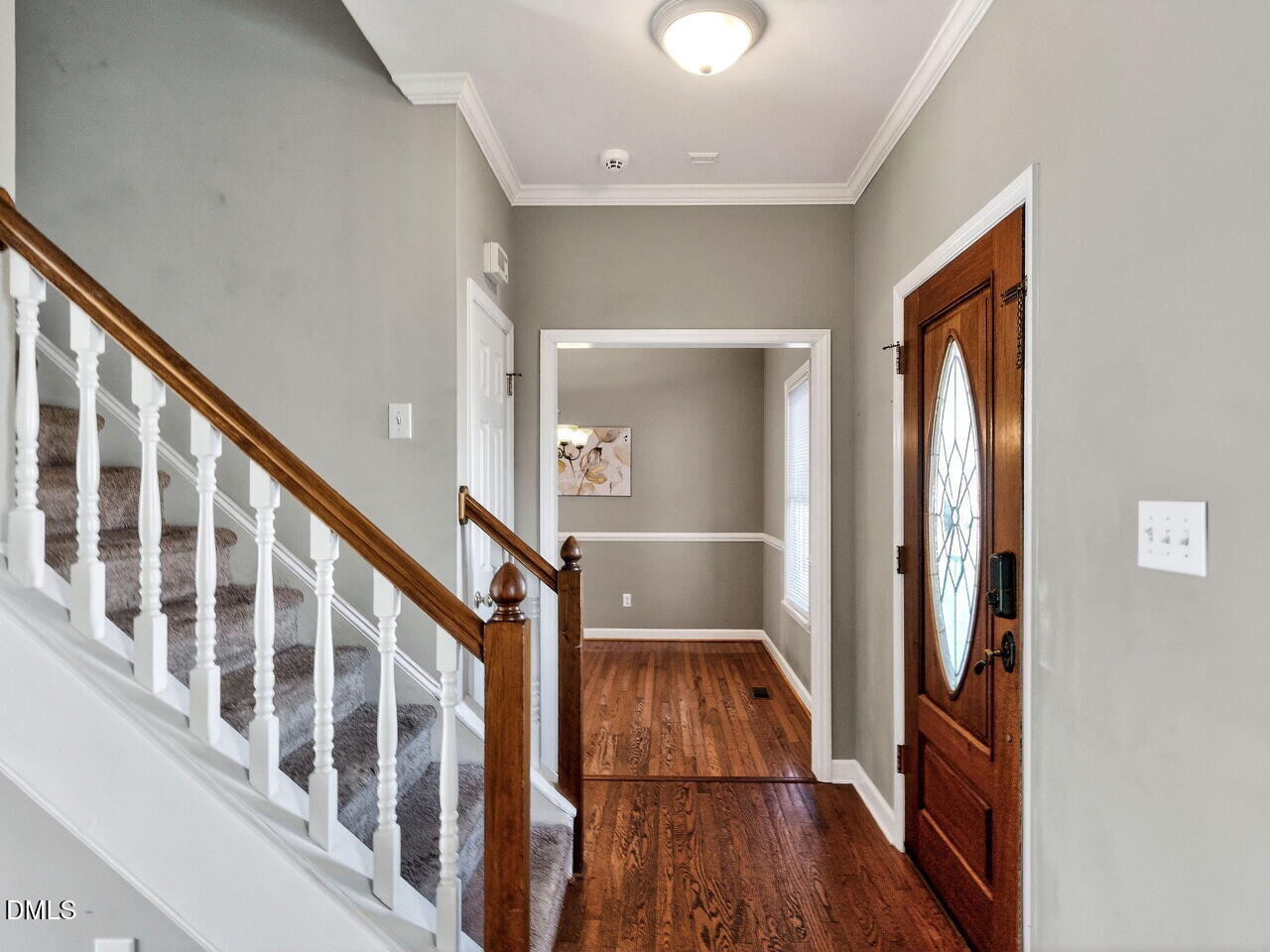 4500 Rivershyre Way Raleigh, NC 27616 - Photo 4 of 42 a view of an entryway with wooden floor