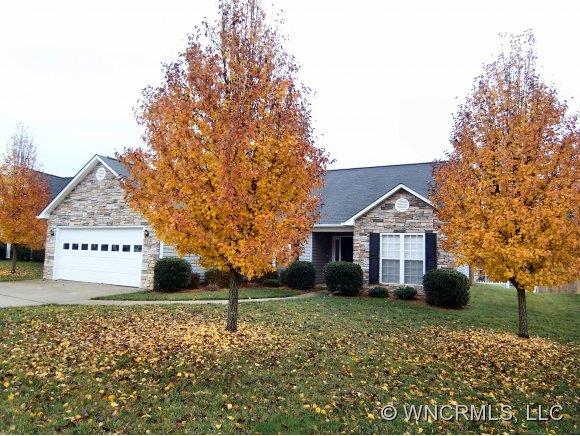 93 Morning Mist Road Fletcher, NC 28732 - Photo 1 of 12 a front view of a house with a garden