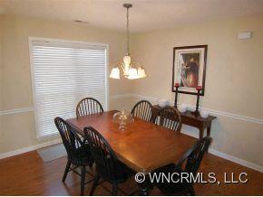 93 Morning Mist Road Fletcher, NC 28732 - Photo 2 of 12 a view of a dining room with furniture