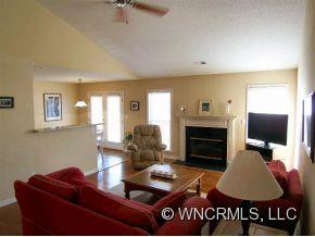 93 Morning Mist Road Fletcher, NC 28732 - Photo 5 of 12 a living room with furniture and a fireplace