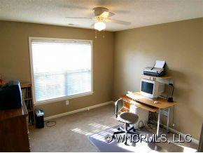 93 Morning Mist Road Fletcher, NC 28732 - Photo 10 of 12 a workspace with furniture and chandelier