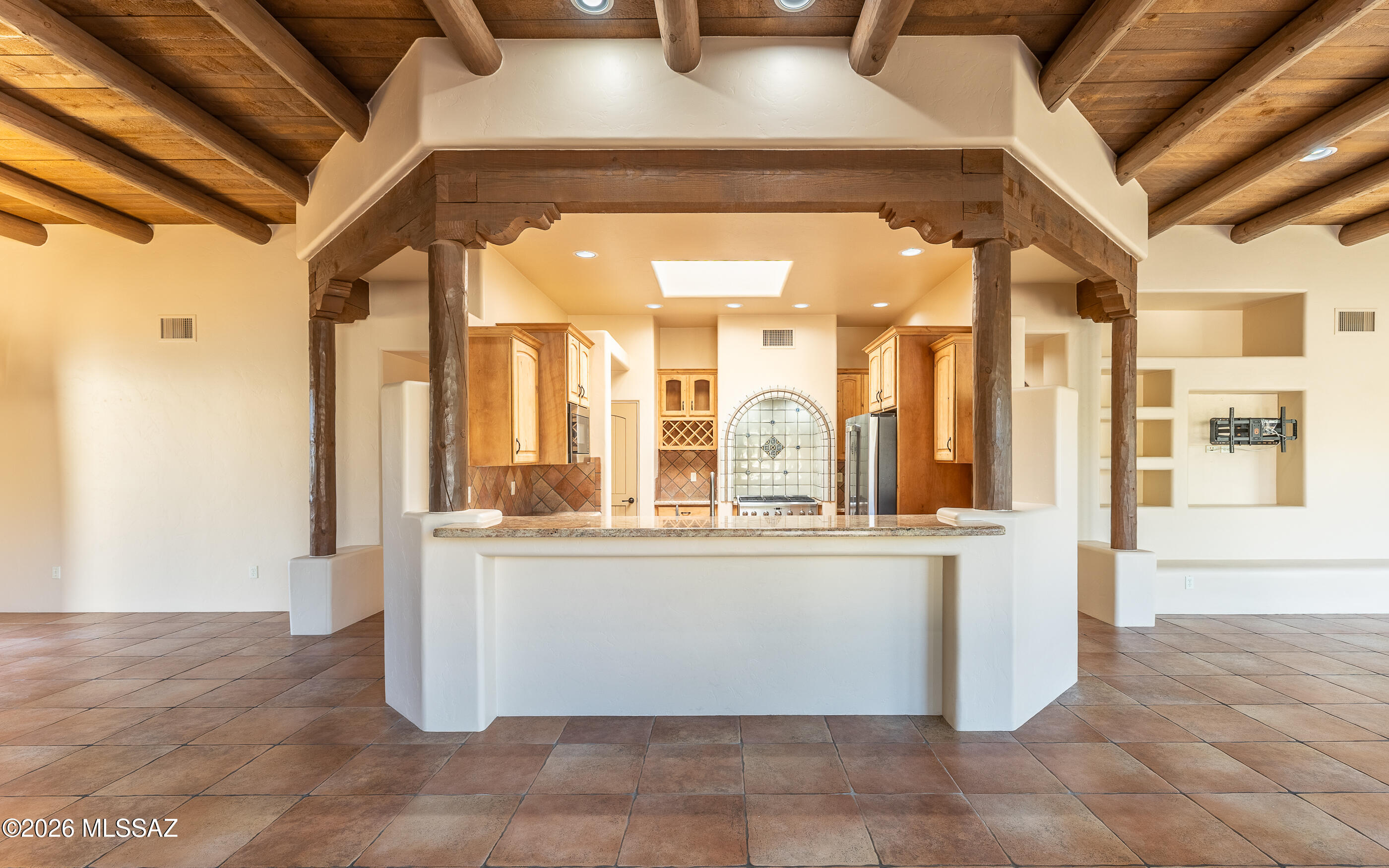 5550 West Open R Place Tucson, AZ 85713 - Photo 6 of 48 Entertainers and home chefs will love the well-appointed kitchen, complete with generous cabinetry and luxurious granite countertops ready for all your culinary creations. Notice the breakfast bar!