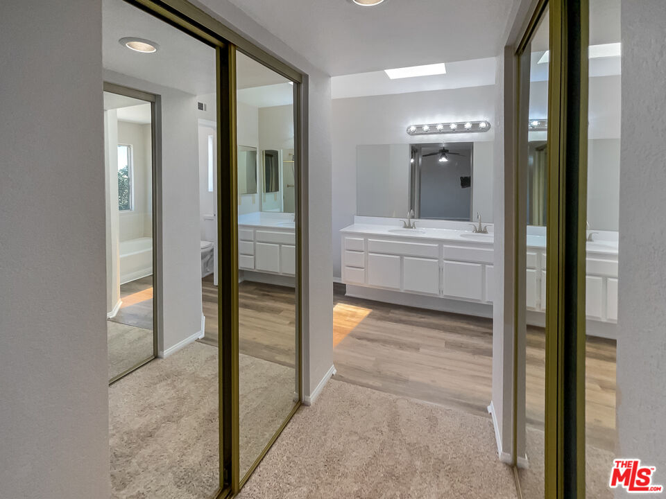 1615 East Kettering Street Lancaster, CA 93535 - Photo 11 of 15 a bathroom with a tub and shower