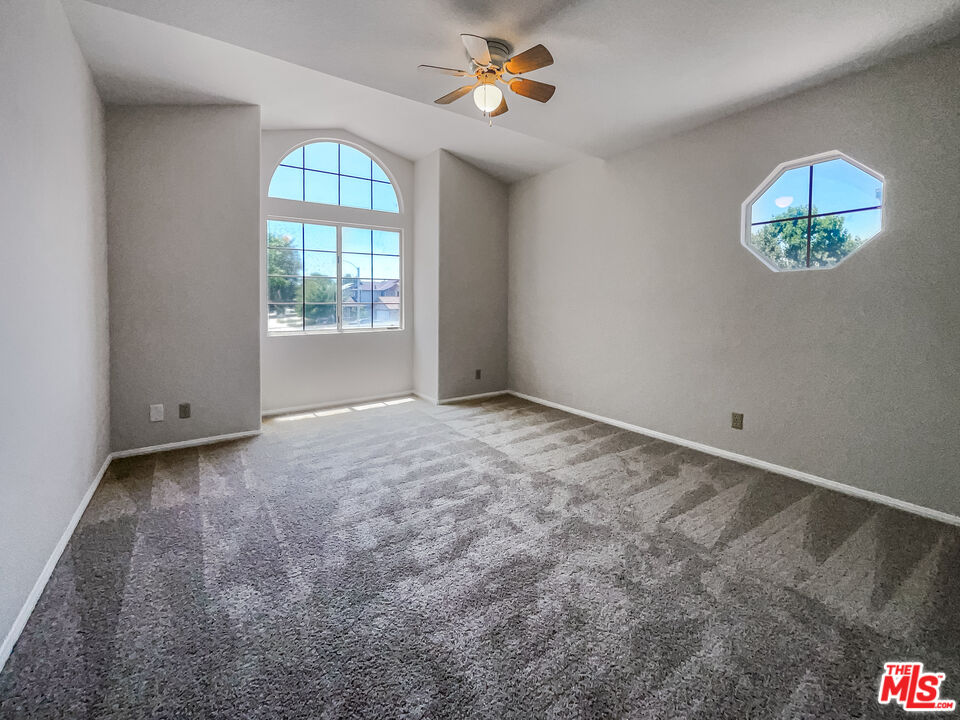 1615 East Kettering Street Lancaster, CA 93535 - Photo 13 of 15 a view of an empty room with a window