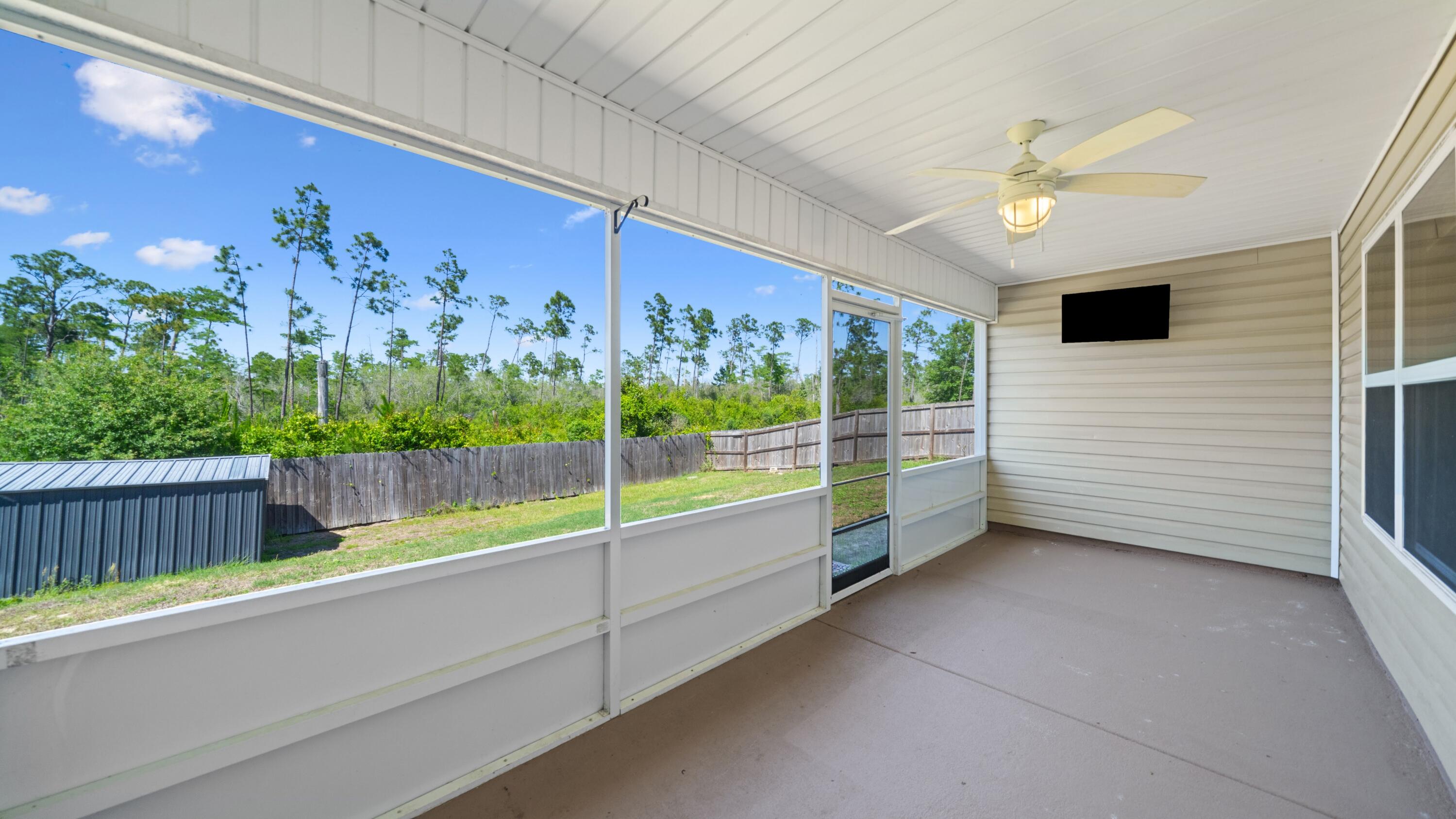 3927 Alva Thomas Road Panama City, FL 32404 - Photo 30 of 46 a view of an entryway with wooden floor