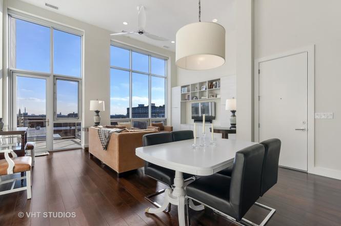 1132 West Adams Street, Unit PHE Chicago, IL 60607 - Photo 4 of 23 a kitchen with a dining table chairs and view living room
