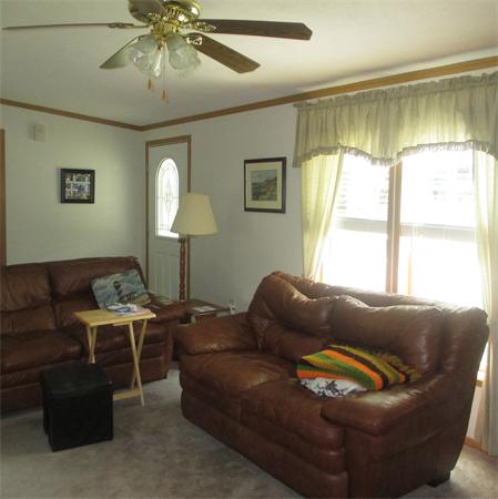 32 Lower Windbrook Drive, Unit 32 Auburn, MA 01501 - Photo 5 of 13 a living room with furniture and a large window