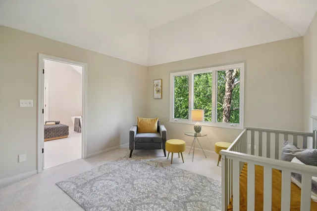 a living room with furniture and a couch