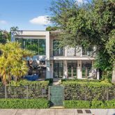 front view of a house with a garden