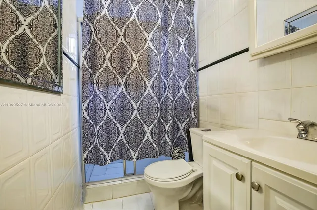 a bathroom with a sink and toilet