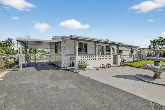 a view of a house with a patio