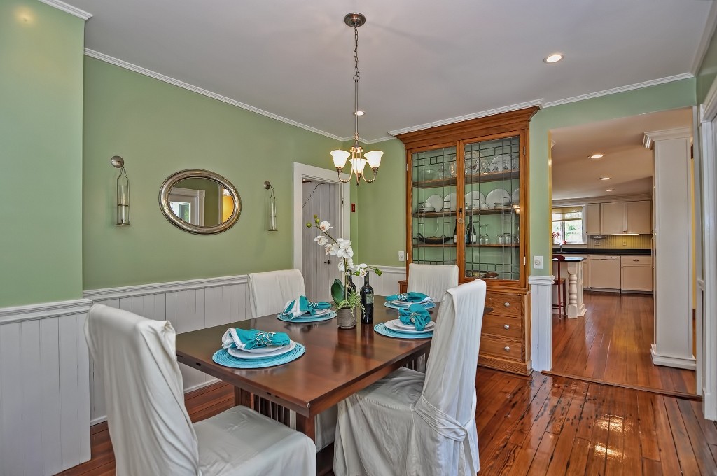 73 Frankland Road Ashland, MA 01721 - Photo 14 of 30 a view of a dining room with furniture and wooden floor