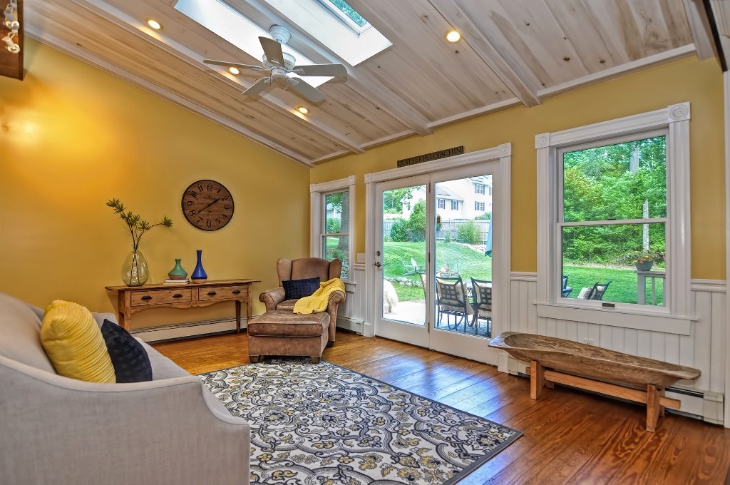 73 Frankland Road Ashland, MA 01721 - Photo 21 of 30 a living room with furniture and a wooden floor