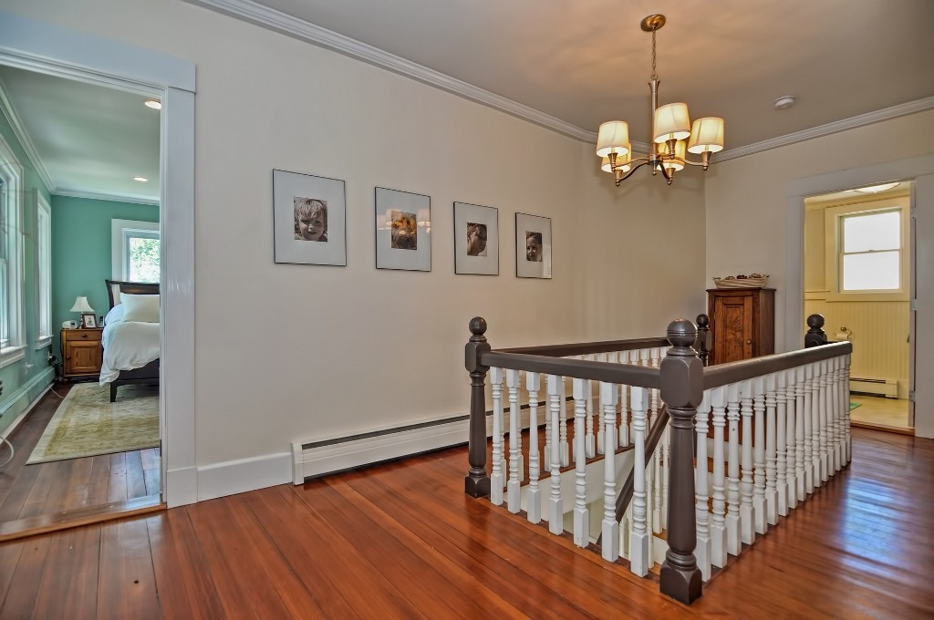 73 Frankland Road Ashland, MA 01721 - Photo 23 of 30 a view of a livingroom with wooden floor and furniture