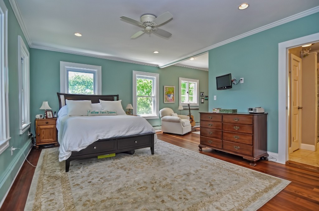 73 Frankland Road Ashland, MA 01721 - Photo 24 of 30 a bed room with a bed and furniture
