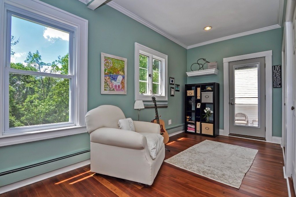 73 Frankland Road Ashland, MA 01721 - Photo 25 of 30 a living room with furniture and a window