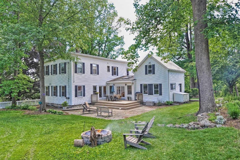 73 Frankland Road Ashland, MA 01721 - Photo 5 of 30 a front view of house with yard and green space