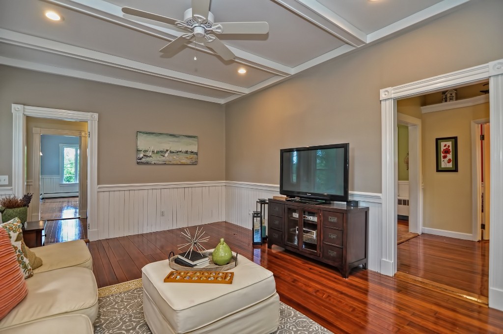 73 Frankland Road Ashland, MA 01721 - Photo 10 of 30 a living room with furniture and a flat screen tv