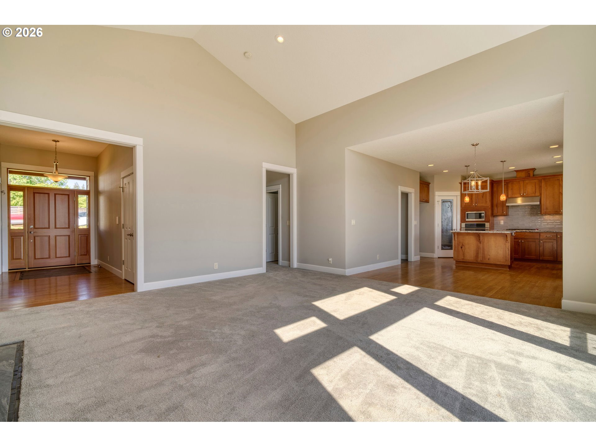 33058 Church Road Warren, OR 97053 - Photo 10 of 45 a view of a living room kitchen and a sink