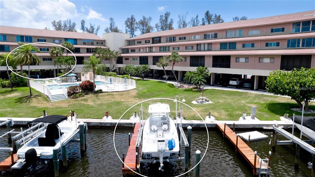 9604 Cortez Road West, Unit 213 Bradenton, FL 34210 - Photo 2 of 36 a view of swimming pool with outdoor seating and city view