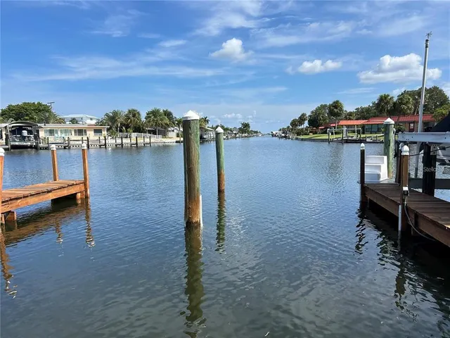 a view of a lake with boats