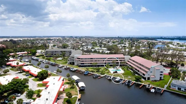 an aerial view of a tennis ground and a terrace