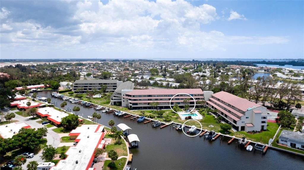 9604 Cortez Road West, Unit 213 Bradenton, FL 34210 - Photo 3 of 36 an aerial view of a tennis ground and a terrace