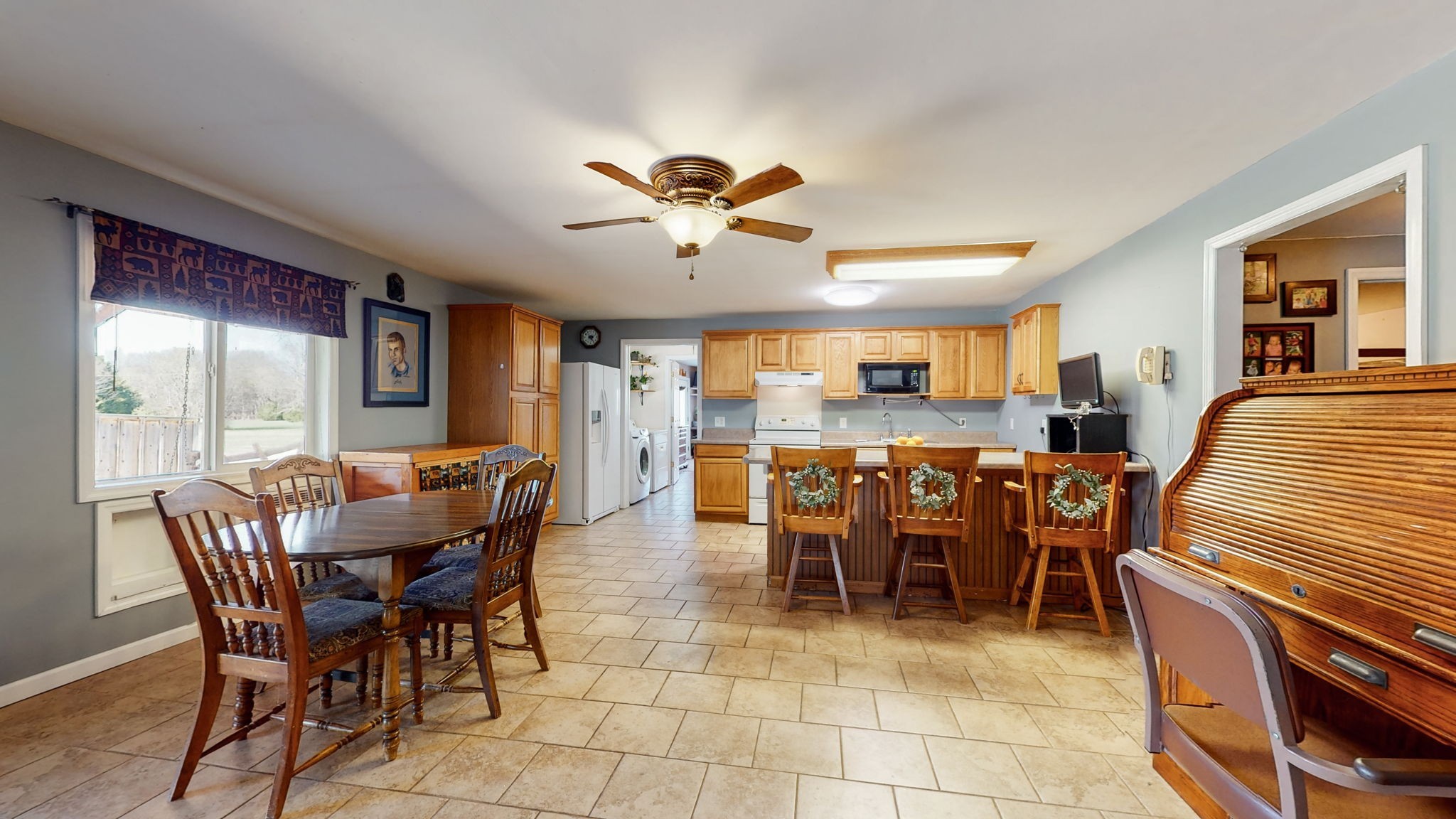 4605 Pyles Road Chapel Hill, TN 37034 - Photo 16 of 28 a dining room with furniture a chandelier and window