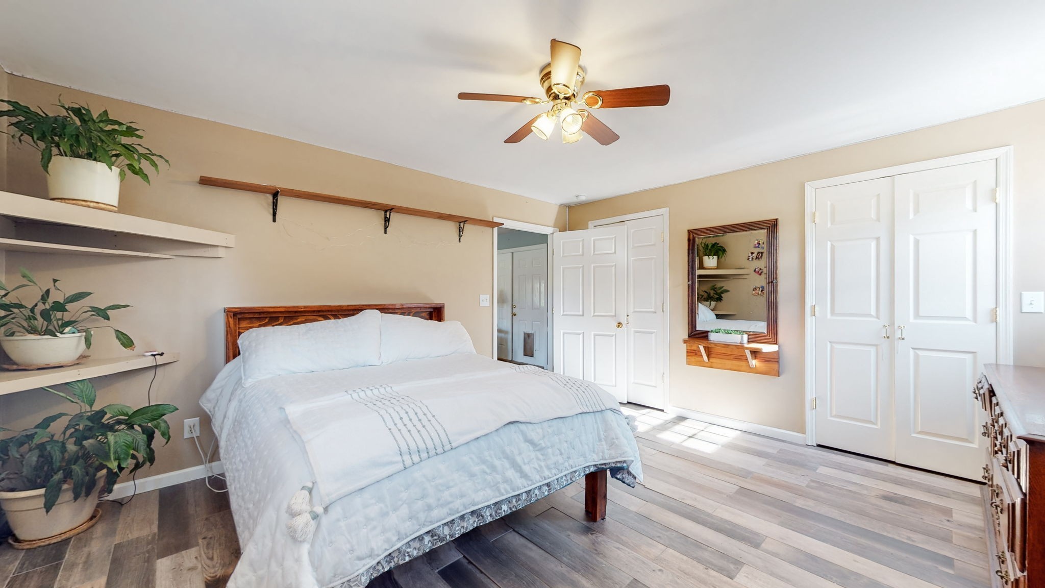 4605 Pyles Road Chapel Hill, TN 37034 - Photo 21 of 28 a bedroom with a bed and wooden floor