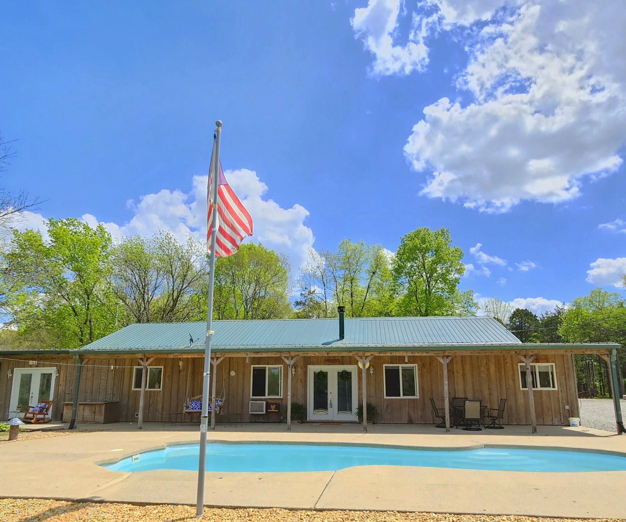 4605 Pyles Road Chapel Hill, TN 37034 - Photo 3 of 28 a front view of a house with a garden and plants