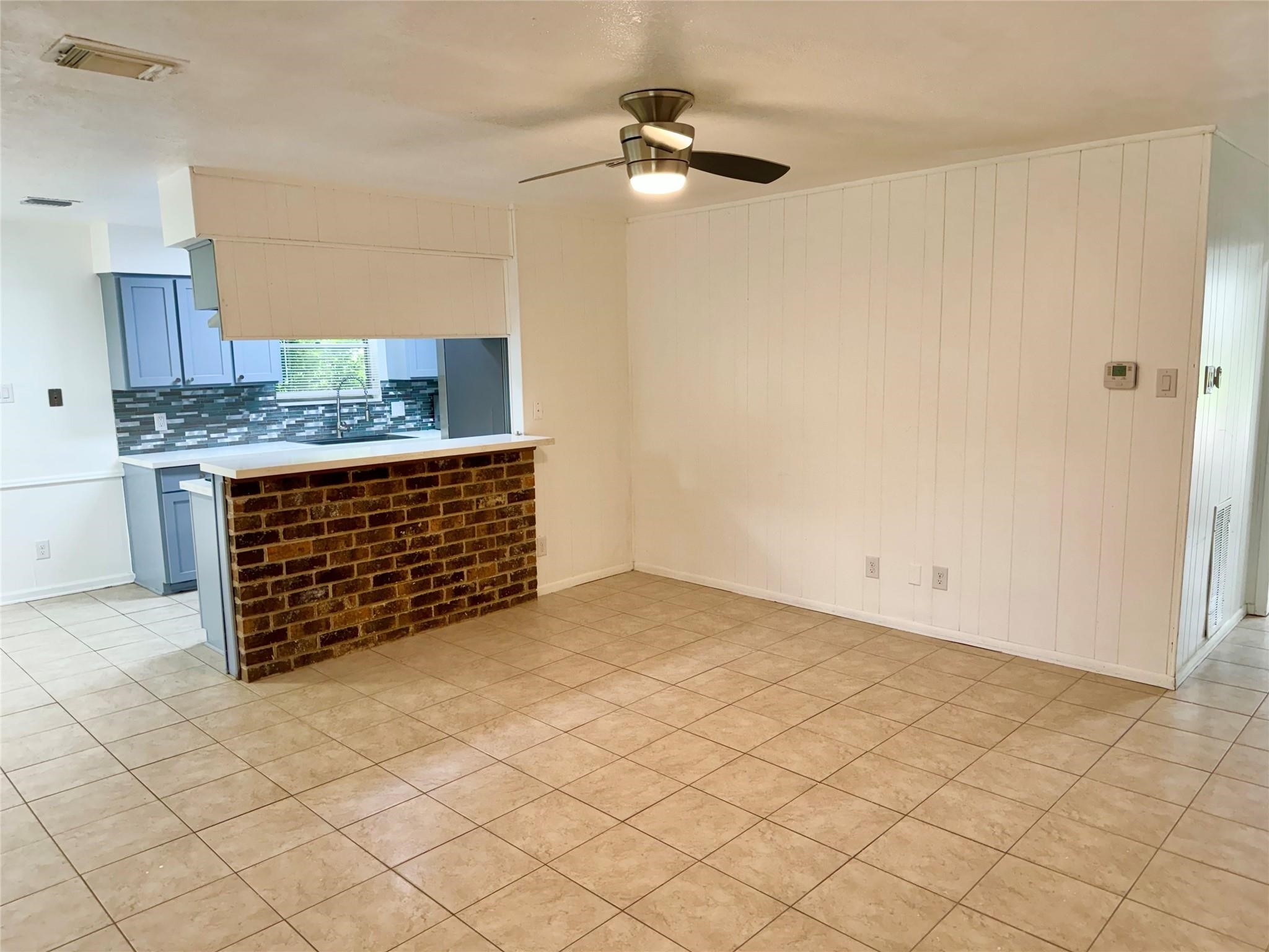 7015 Pyron Way Houston, TX 77036 - Photo 2 of 12 a living room with a rug