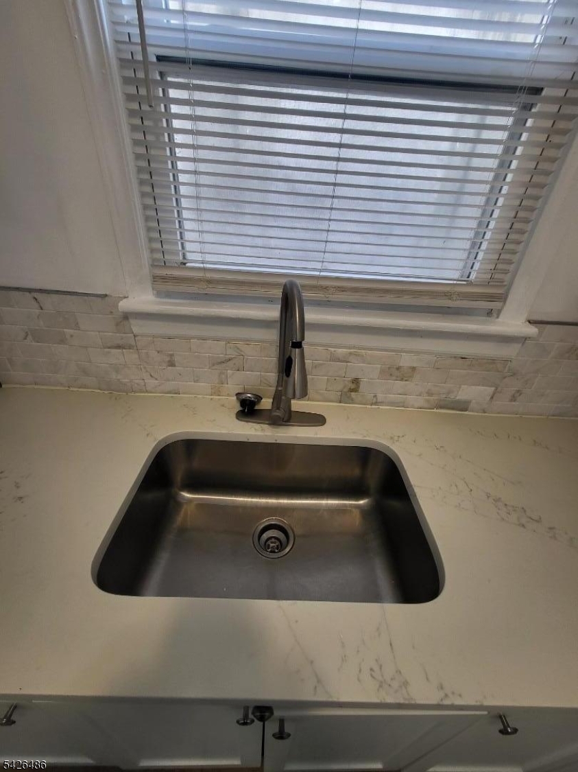 111 Pine Street Elizabeth Port, NJ 07206 - Photo 4 of 9 a close view of sink and tap