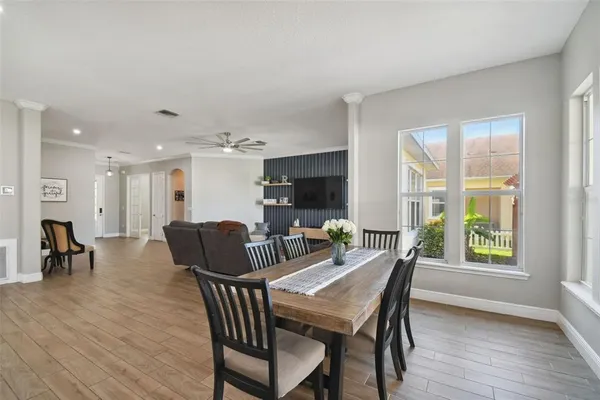 a view of a livingroom with furniture and a window