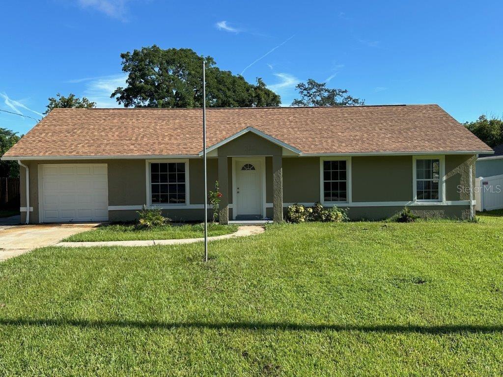 110 Angeles Road DeBary, FL 32713 - Photo 1 of 1 a front view of a house with a yard