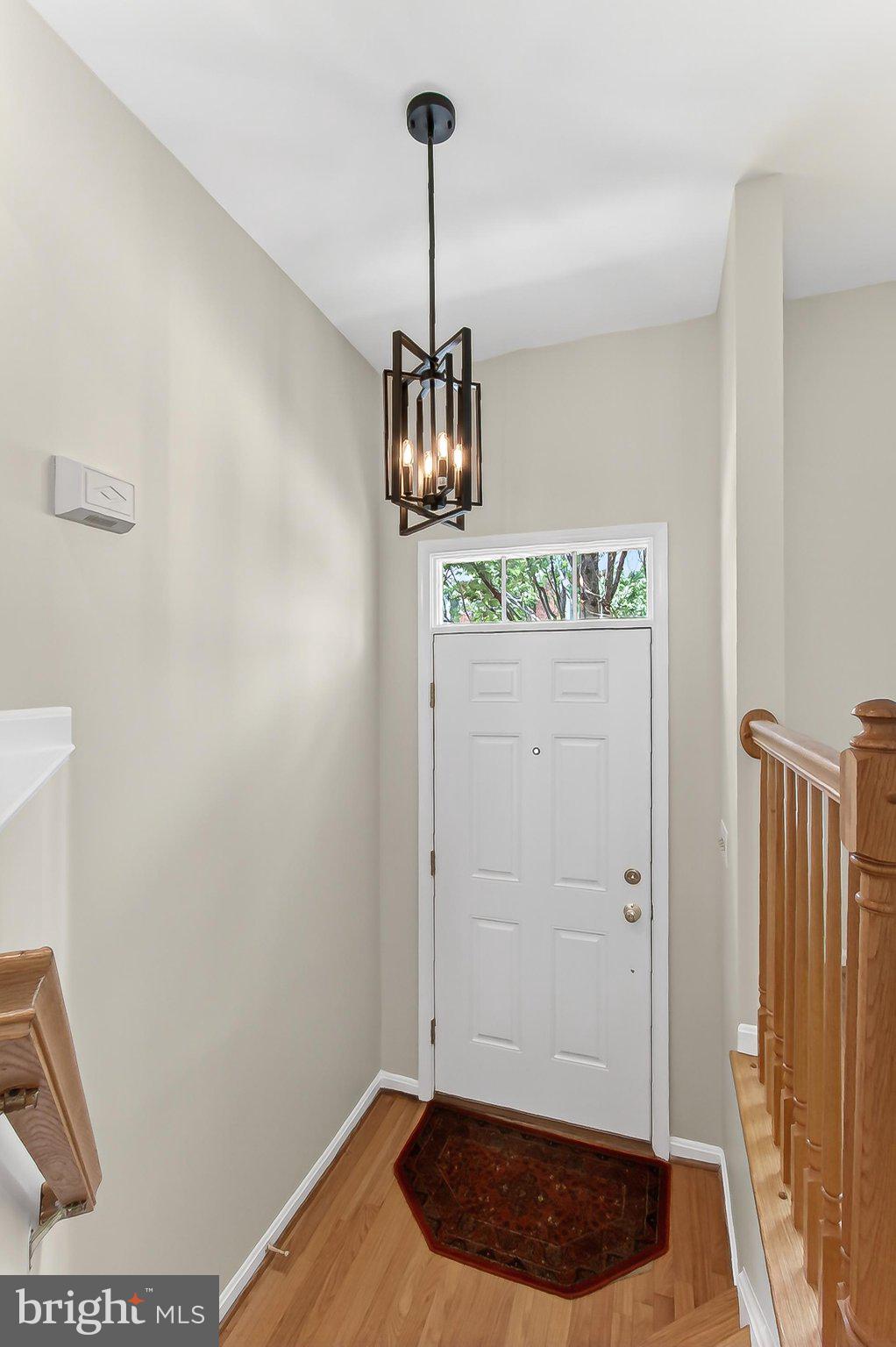 13157 Kidwell Field Road Herndon, VA 20171 - Photo 8 of 50 Inviting entryway with modern charm.