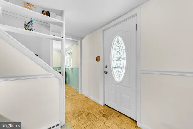 a view of front door with hallway