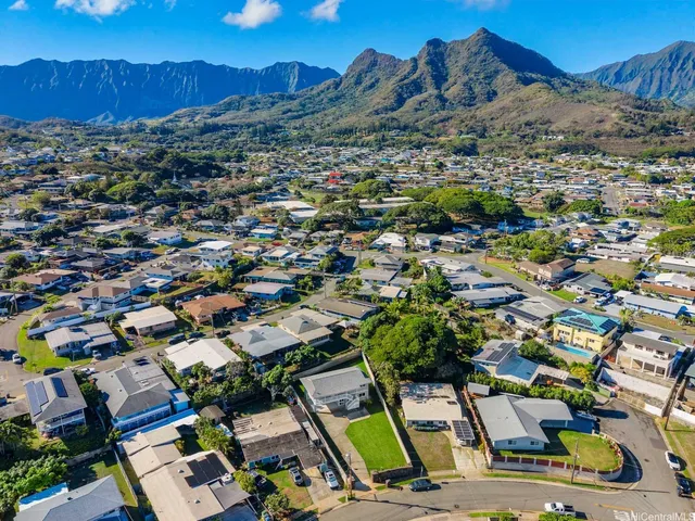 a view of residential houses with outdoor space