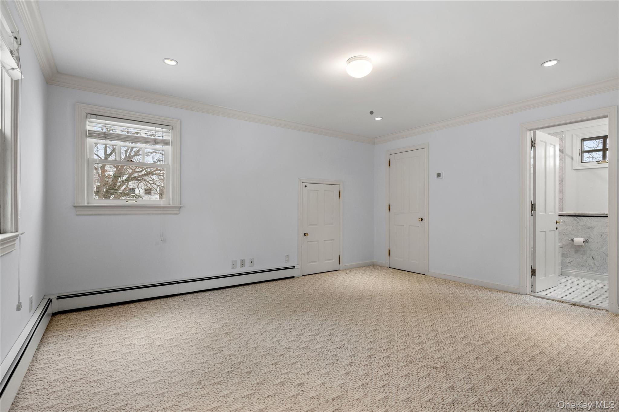 103 Pleasant Ridge Road Harrison, NY 10528 - Photo 29 of 39 an empty room with windows