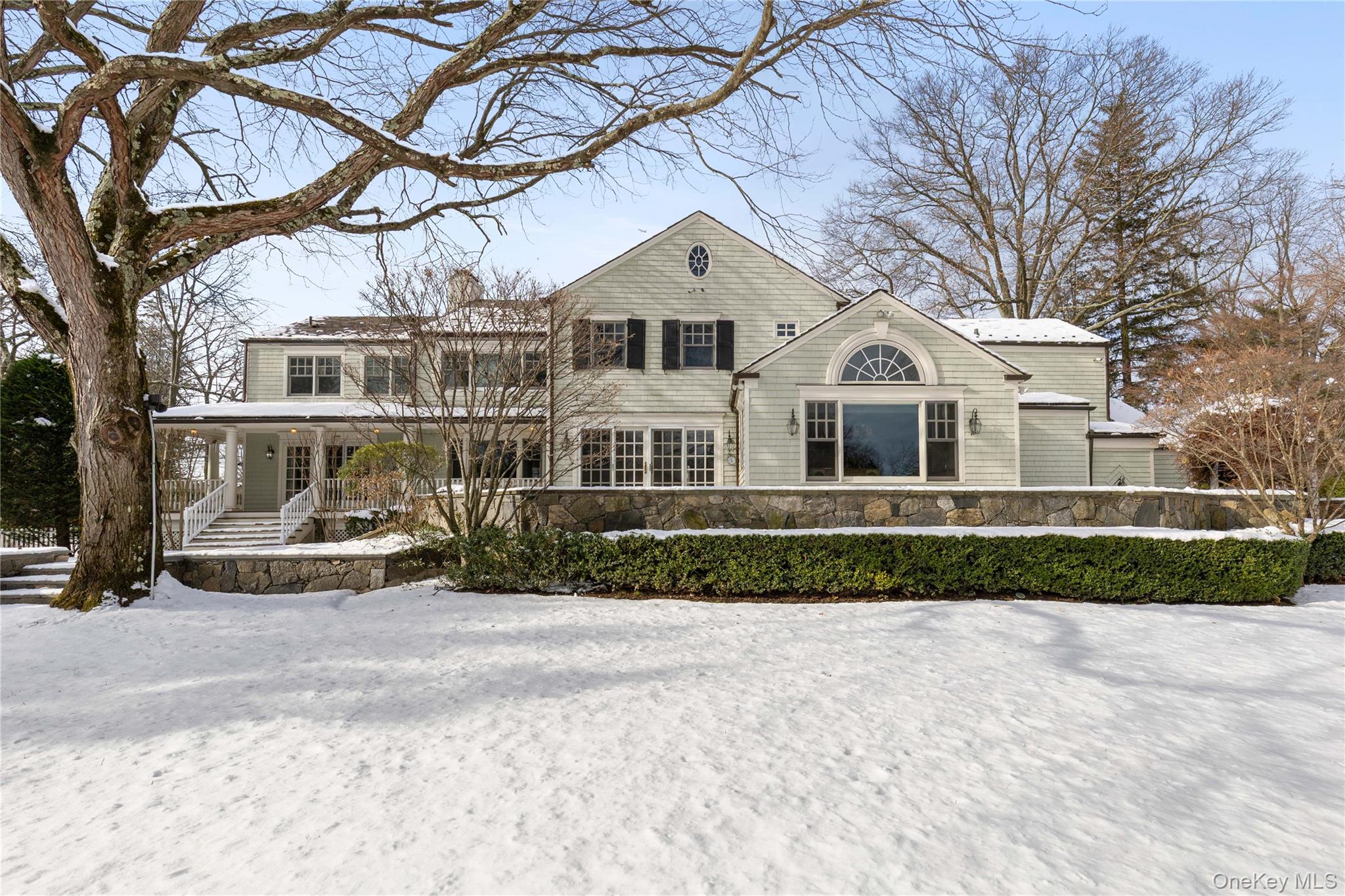 103 Pleasant Ridge Road Harrison, NY 10528 - Photo 34 of 39 a front view of a house with a yard